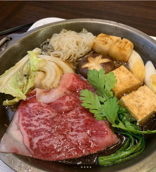 Asakusa Imahan sukiyaki with marbled wagyu beef and vegetables in a hot pot